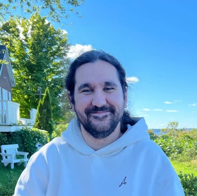A photograph of Mert Guler